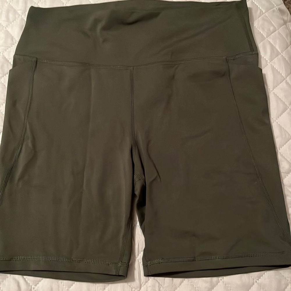 Like new olive green 7” inseam Senita shorts